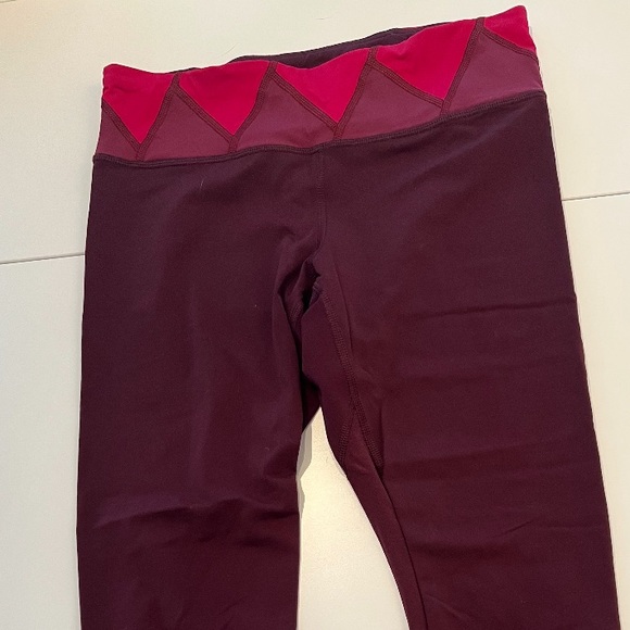 lululemon | Inspire Crop | size 6 | Maroon | rip on leg - Picture 2 of 7